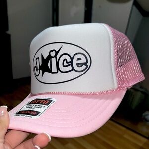 Trucker hats in colors: baby pink, blue, and green
